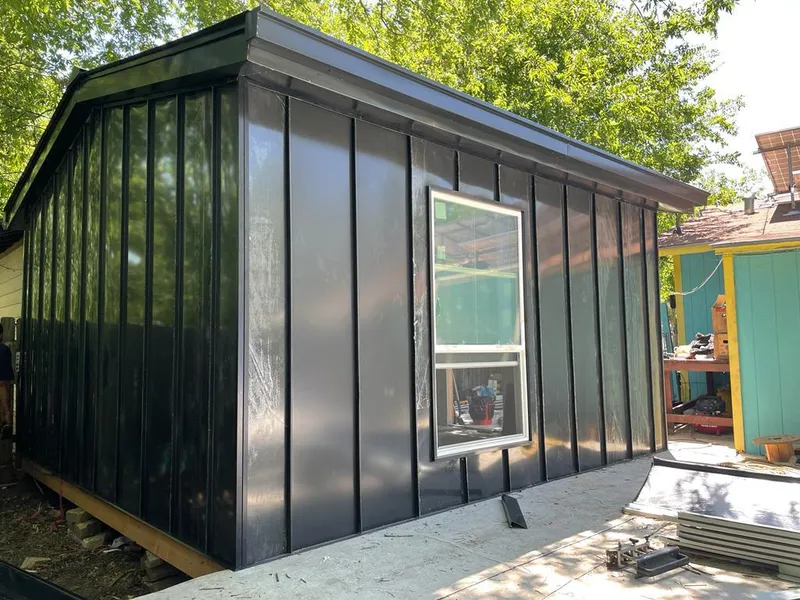 Black standing seam metal wall panels for Roof Inspection in Gypsum